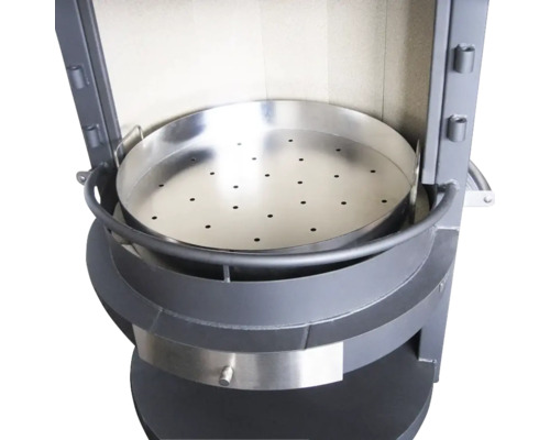 Vue détaillée d''un poêle à bois avec tôle perforée