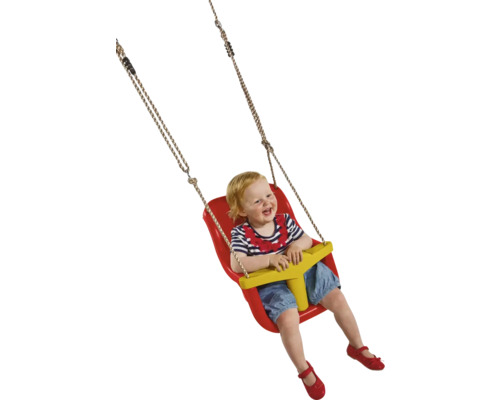 Enfant assis sur une balançoire rouge pour enfant avec poignée jaune
