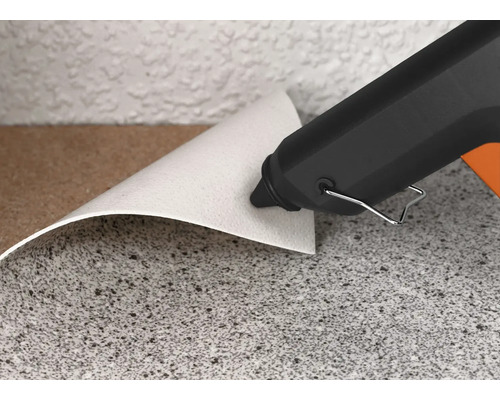 Heissleim-Pistole beim Verkleben von Materialien