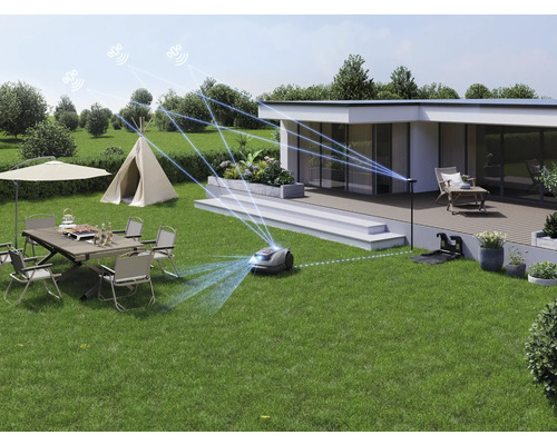 Robot tondeuse naviguant dans un jardin avec terrasse, tente et mobilier de jardin.