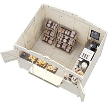 Cabane de jardin en bois avec aménagement de boulangerie, comprenant des étagères, du pain, des pâtisseries, une machine à café et un comptoir