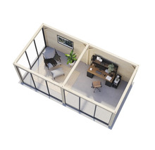 Intérieur d''un chalet de jardin moderne avec bureau et coin salon