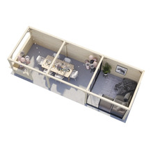 Vue intérieure d''une maison de jardin en bois avec coin repas et coin salon