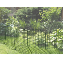 Clôture de jardin décorative en métal pour délimiter les parterres de fleurs dans le jardin.