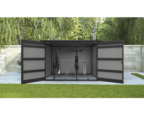Garage à vélos avec deux vélos dans le jardin