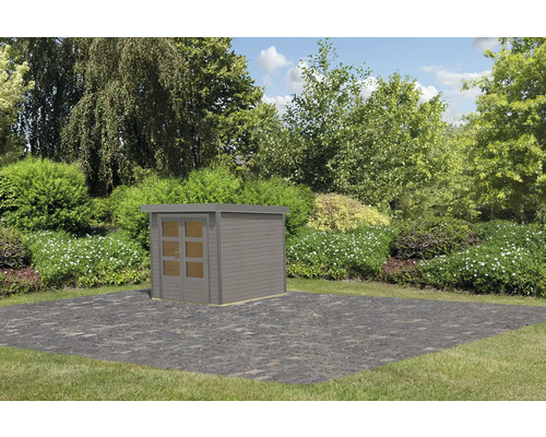 Abri de jardin en bois avec porte dans le jardin