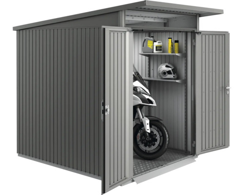 Abri de jardin métallique avec moto, étagères et accessoires