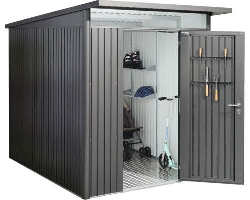 Abri de jardin métallique avec porte ouverte et outils de jardinage