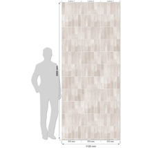 Motif de carreaux muraux avec dimensions et une personne pour comparer les tailles.