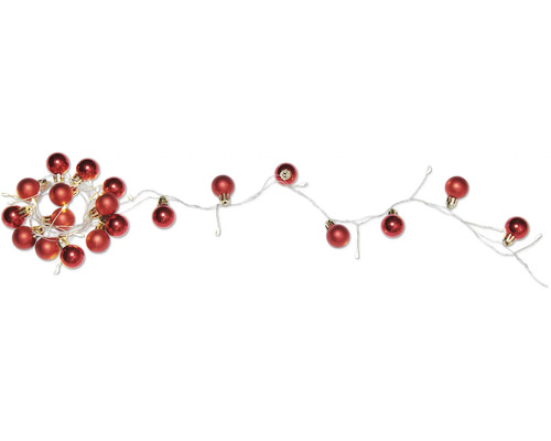 Lichterkette mit roten Weihnachtskugeln