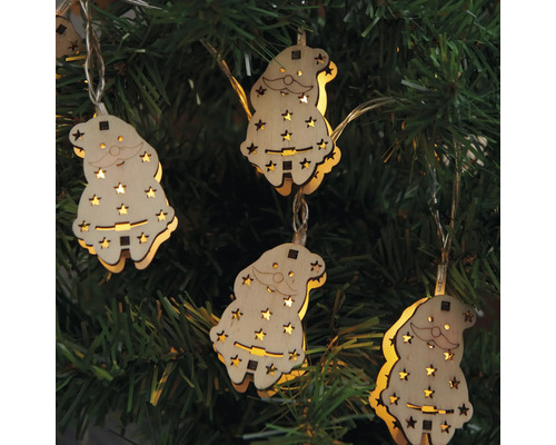 Weihnachtsbaum mit hölzerner Weihnachtsmann-Lichterkette