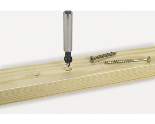 Planche en bois avec fraise et vis.