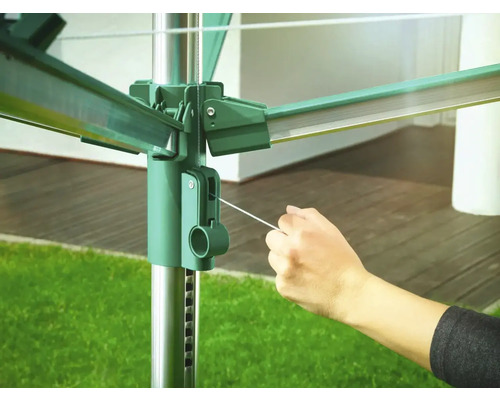 Drehflügelwäschetrockner mit Bedienmechanismus im Einsatz.