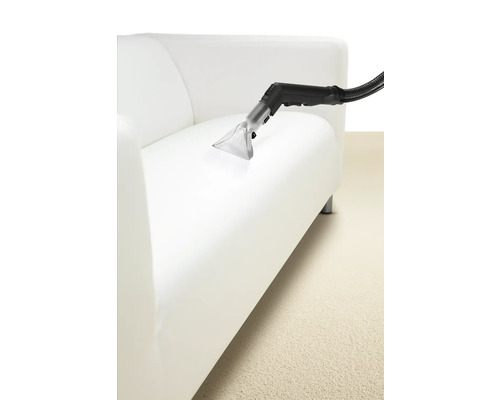 Nettoyage d'un canapé avec un aspirateur de lavage