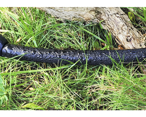 Gartenschlauch auf Rasen