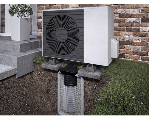 Pompe à chaleur extérieure avec puits d'infiltration perméable pour l'évacuation des eaux de pluie