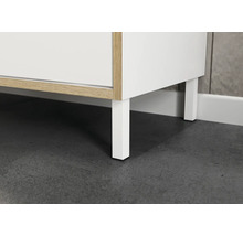 Vue détaillée d'un meuble bas de salle de bains avec pieds blancs