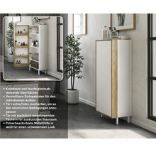 Weißer Badezimmerschrank mit Holzdetails und Metallfüßen