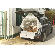 Voiture avec hayon ouvert, chargée d'un big bag rempli de briques et de gravats