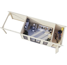 Vue de dessus d'une cabane de jardin avec bureau, coin salon et débarras