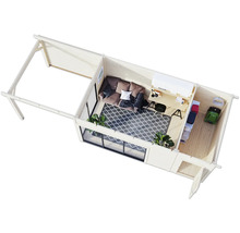 Vue de dessus d'une maison de jardin moderne avec terrasse, salon, espace de travail et espace de rangement