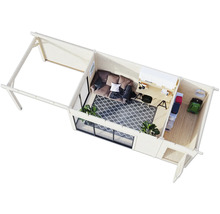 Vue de dessus d'une cabane de jardin avec espace de vie et espace de travail