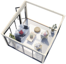 Oasis de jardin lumineuse avec canapé, table et fauteuils en rotin