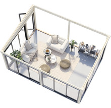 Vue d'un salon dans une maison de jardin avec des meubles