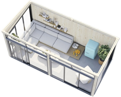 Intérieur d'une cabane de jardin avec canapé, table et réfrigérateur