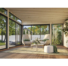 Pavillon lumineux avec coin salon et grandes fenêtres