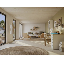 Espace de vie lumineux avec coin salon, mannequin de couture et espace de travail