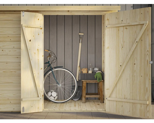 Abri de jardin en bois ouvert avec outils de jardin et vélo