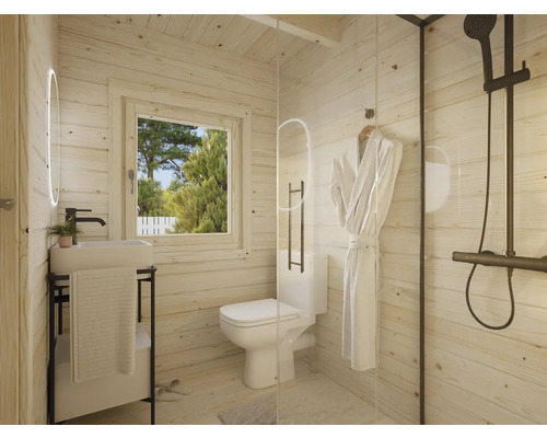 Salle de bain avec douche, toilettes, lavabo et miroir dans une maison en bois