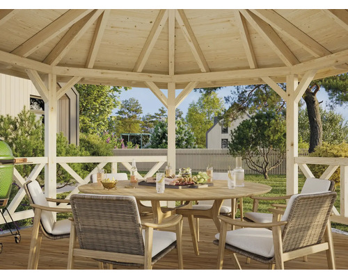 Pavillon de jardin en bois avec mobilier de jardin sur une terrasse en bois