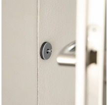 Butoir de porte gris monté au mur