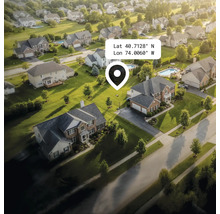 Vue aérienne d'un quartier résidentiel avec maisons, jardins et rues