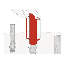 Illustration d'un enfonce-pieux utilisé pour enfoncer un poteau en bois.