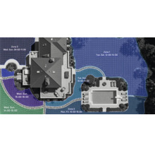 Vue de dessus d'une maison avec jardin et zones d'irrigation.