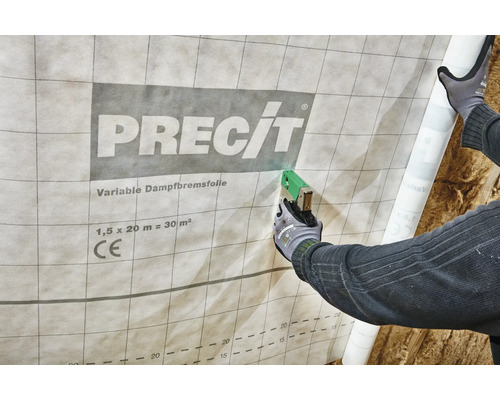 Application d'un film pare-vapeur variable de la marque Precit avec une agrafeuse