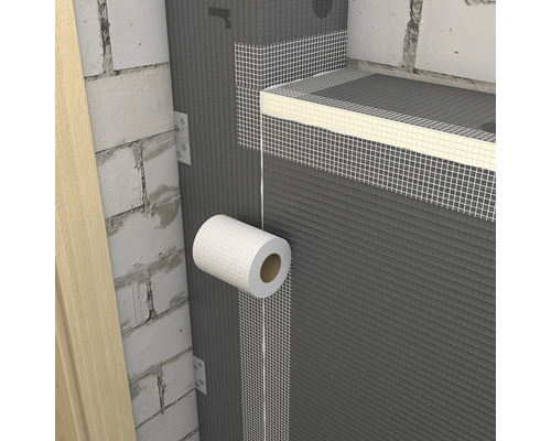 Vue intérieure d'un mur avec isolation et bande d'étanchéité.