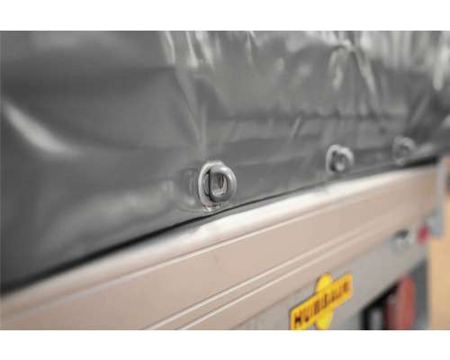 Graue Anhängerplane mit Kunststoffösen an der Bordwand, Humbaur Logo