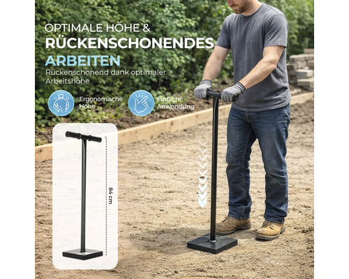 Handstampfer aus Metall mit einer Höhe von 84 Zentimeter, verwendet von einer Person zur Bodenverdichtung im Garten.