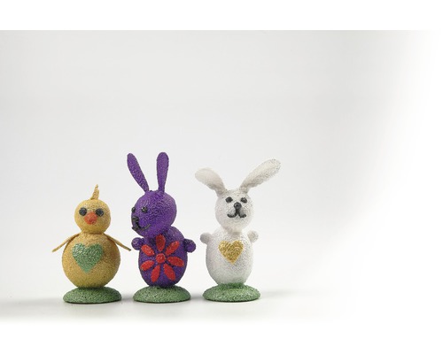 Ensemble de décoration de Pâques avec un poussin et deux figurines de lapin