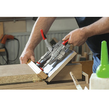 Verwendung einer Zwinge zum Verleimen von Holzplatten