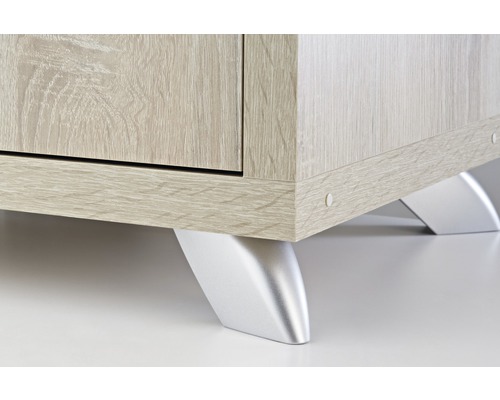 Detailaufnahme eines Möbelstücks mit Holzstruktur und silberfarbenen Füßen