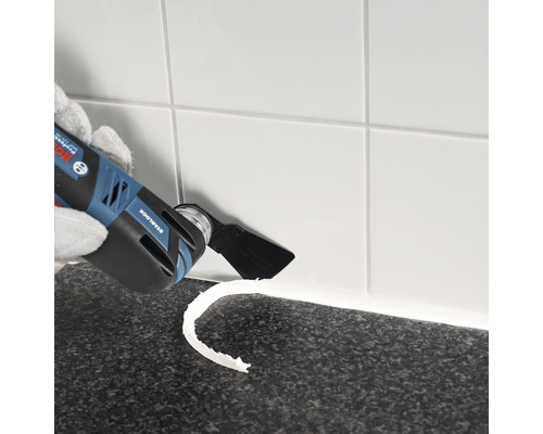 Outil multifonction pour retirer le joint entre les carreaux