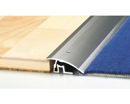 Profilé de transition entre un plancher en bois et une moquette