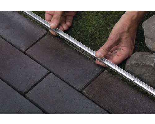 Pose de pavés avec profilé de bordure