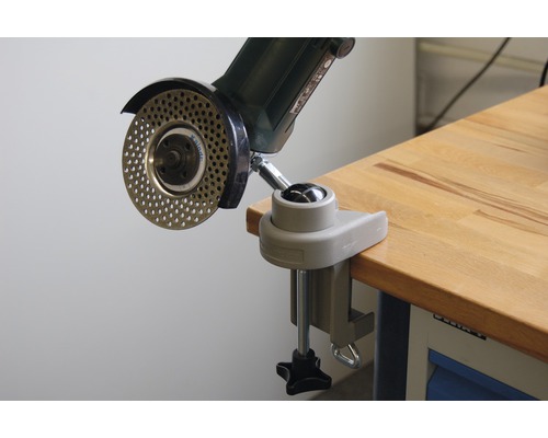 Winkelschleifer mit Schleifscheibe in Werkbankhalterung