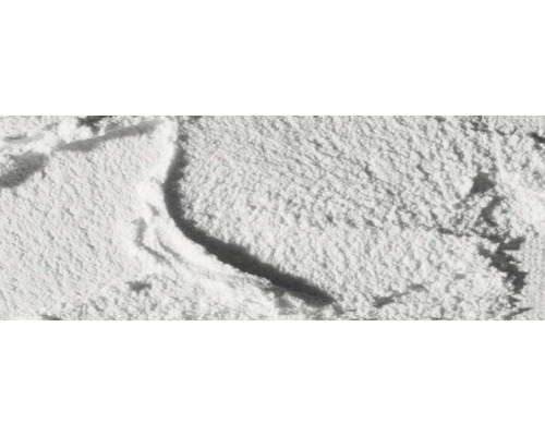 Nahaufnahme von weißem Fugensand mit Rillen